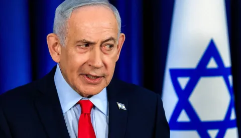 TOPSHOT - Israeli Prime Minister Benjamin Netanyahu speaks during a press conference in Jerusalem on March 19, 2026. (Photo by Ronen Zvulun/POOL/AFP)/