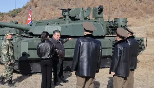 This picture taken on March 19, 2026 and released by North Korea's official Korean Central News Agency (KCNA) via KNS on March 20, 2026 shows North Korean leader Kim Jong Un and his daughter Kim Ju Ae visiting the Pyongyang Training Base No. 60 under the Capital City Defence Corps of the North Korean's Army. (Photo by KCNA VIA KNS/AFP)/South Korea OUT/---EDITORS NOTE--- RESTRICTED TO EDITORIAL USE - MANDATORY CREDIT "AFP PHOTO/KCNA VIA KNS" - NO MARKETING NO ADVERTISING CAMPAIGNS - DISTRIBUTED AS A SERVICE TO CLIENTSTHIS PICTURE WAS MADE AVAILABLE BY A THIRD PARTY. AFP CAN NOT INDEPENDENTLY VERIFY THE AUTHENTICITY, LOCATION, DATE AND CONTENT OF THIS IMAGE./