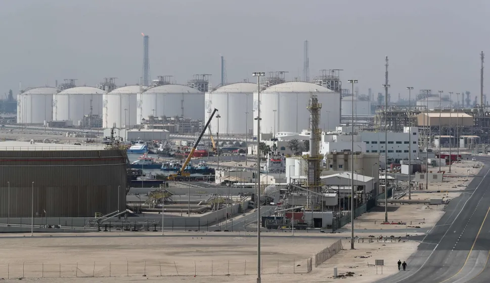 TOPSHOT - (FILES) This picture shows the Ras Laffan Industrial City, Qatar's principal site for production of liquefied natural gas and gas-to-liquid, administrated by Qatar Petroleum, some 80 kilometers (50 miles) north of the capital Doha, on February 6, 2017. Tehran on March 19, 2026, has carried out a series of attacks on Gulf energy sites, including on Qatar's huge Ras Laffan LNG facility, in retaliation for an Israeli strike on Iran's South Pars gas field -- part of the world's largest natural gas reservoir. (Photo by KARIM JAAFAR/AFP)