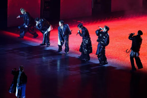 K-pop boy group BTS perform during their concert at Gwanghwamun Square in Seoul on March 21, 2026. South Korean megastars BTS reunite on March 21, for their first show in nearly four years, with an expected 260,000 fans taking over central Seoul for a K-pop extravaganza livestreamed to millions more worldwide. (Photo by Kim Hong-Ji/POOL/AFP)