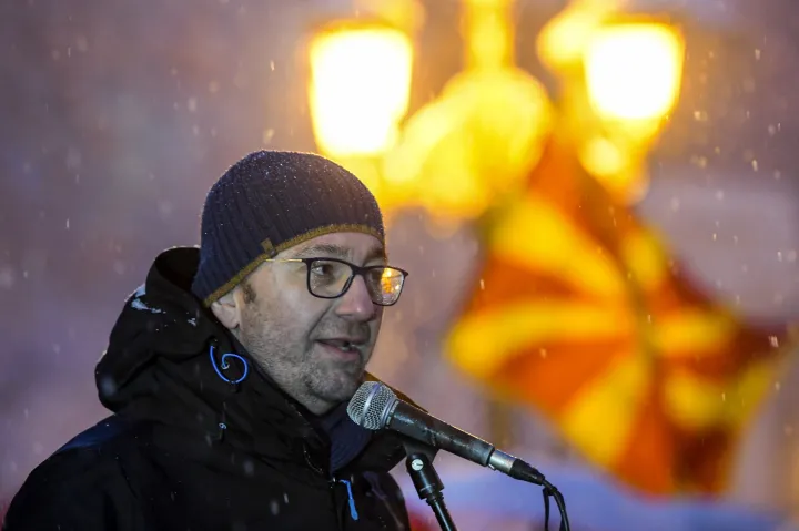 epa07273643 Hristijan Mickovski, leader of the biggest opposition party VMRO DPMNE, addresses supporters of the movement 'boycotting' against the changing the constitution and the country's name to the Republic of North Macedonia in front of the Parliament building in Skopje, The Former Yugoslav Republic of Macedonia, 10 January 2019. Reports state that the Macedonian parliament cancelled the start of the final session that needs to start on 10 January and scheduled for the next day. The Parliamentary session for the renaming the country name to North Macedonia is part of a deal with neighboring Greece. The agreement is key for Macedonia's NATO and EU accession process. EPA/GEORGI LICOVSKI