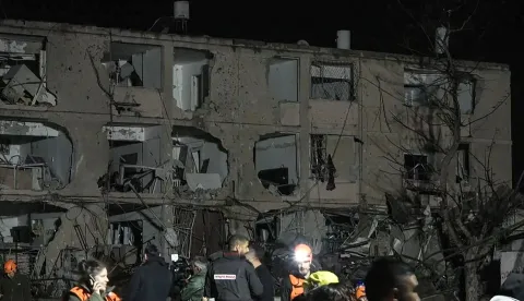 This frame grab from AFPTV footage shows damage to building in the town of Dimona on March 21, 2026. An Iranian missile on March 21, hit the Israeli town of Dimona, home to a nuclear facility, in what the Islamic republic said was retaliation for strikes on its own nuclear site at Natanz. Dimona hosts a facility just outside the main town widely believed to possess the Middle East's sole nuclear arsenal, although Israel has never admitted to possessing nuclear weapons. (Photo by Jorge NOVOMINSKY/AFPTV/AFP)/