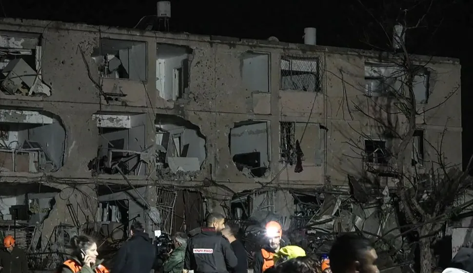This frame grab from AFPTV footage shows damage to building in the town of Dimona on March 21, 2026. An Iranian missile on March 21, hit the Israeli town of Dimona, home to a nuclear facility, in what the Islamic republic said was retaliation for strikes on its own nuclear site at Natanz. Dimona hosts a facility just outside the main town widely believed to possess the Middle East's sole nuclear arsenal, although Israel has never admitted to possessing nuclear weapons. (Photo by Jorge NOVOMINSKY/AFPTV/AFP)/