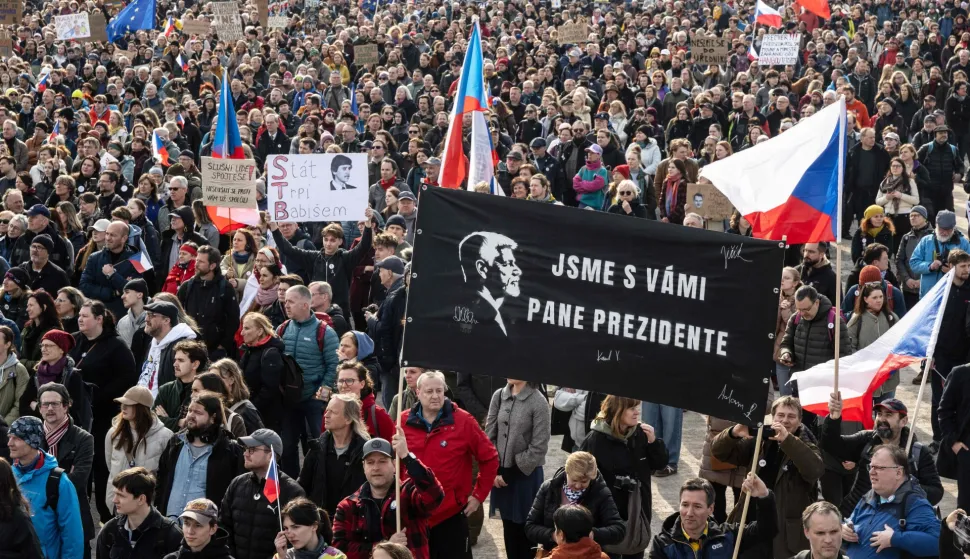 People take part in a rally organised by The Million Moments for Democracy Association as they protest against Czech Prime Minister Andrej Babis and his government on March 21, 2026 in Prague, Czech Republic. (Photo by Michal Cizek/AFP)