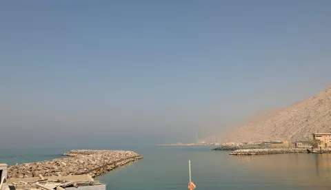 A photograph shows the fishing port of Al Aqir on the Strait of Hormuz in the northern emirate of Ras Al Khaimah on February 25, 2026. (Photo by FADEL SENNA/AFP)