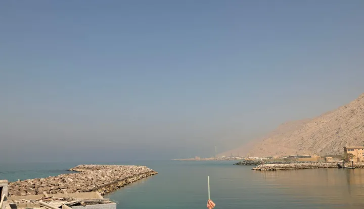 A photograph shows the fishing port of Al Aqir on the Strait of Hormuz in the northern emirate of Ras Al Khaimah on February 25, 2026. (Photo by FADEL SENNA/AFP)