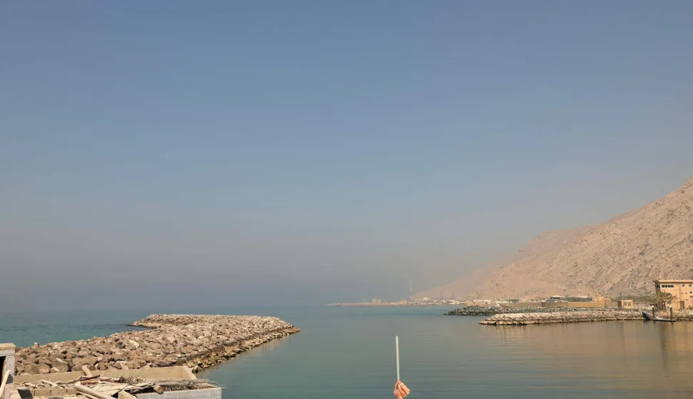 A photograph shows the fishing port of Al Aqir on the Strait of Hormuz in the northern emirate of Ras Al Khaimah on February 25, 2026. (Photo by FADEL SENNA/AFP)
