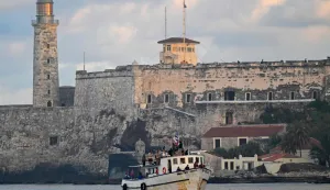 The vessel Maguro, arriving from Mexico with humanitarian aid as part of the Nuestra America convoy, docks at the port of Havana on March 24, 2026. (Photo by Yamil LAGE/AFP)