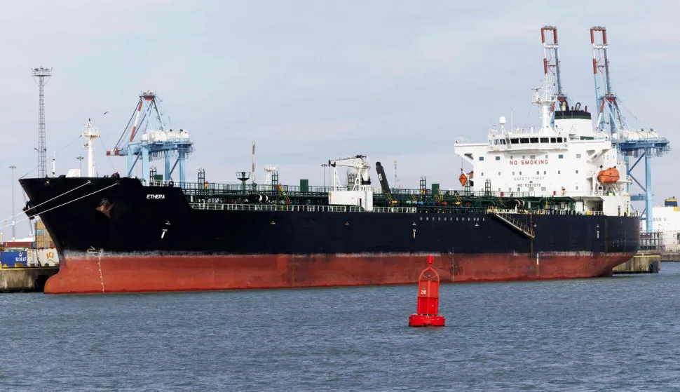 Oil tanker Ethera, part of the "shadow fleet" Russia uses to circumvent Western sanctions over the war in Ukraine, is docked at the naval base in Zeebrugge, northern Belgium, after it was boarded and seized by Belgium's special forces, on March 1, 2026. The tanker flew the flag of Guinea, but an on-board inspection confirmed suspicion that it was sailing under a false flag, Belgian prosecutors said. French President confirmed on X that French naval forces assisted in the operation, calling it a "major blow" to Russia's so-called "shadow fleet". (Photo by NICOLAS MAETERLINCK/Belga/AFP)/Belgium OUT