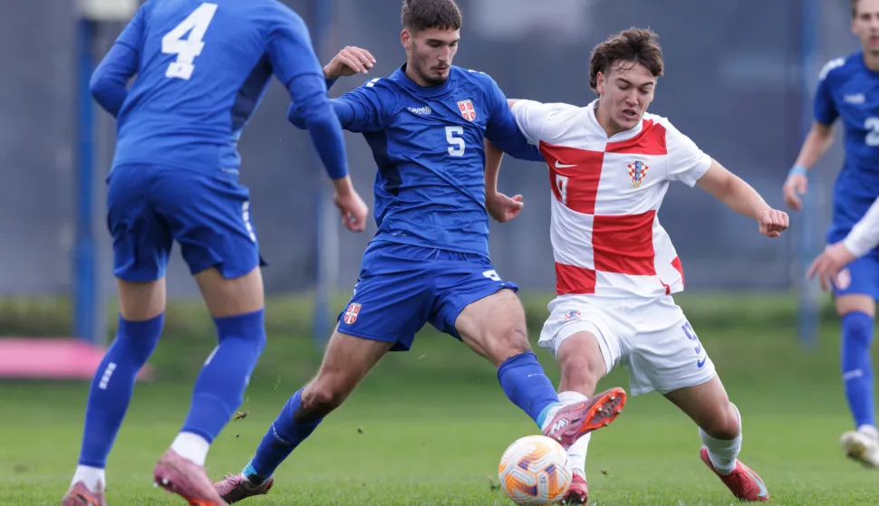 Zagreb, 18.11.2025. - Kvalifikacijska utakmica za Europsko prvenstvo 2026 između U-19 reprezentacija Hrvatske i Srbije.Na fotografiji Nikola Simić, Ivan Barić.foto HINA/ Edvard &Scaron;U&Scaron;AK