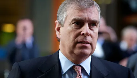 (FILES) Britain's Prince Andrew arrives for a visit to the Cross Rail Head Office in Canary Wharf, east London on March 7, 2011. British police said on February 9, 2026 officers were "assessing" accusations of misconduct in public office against former prince Andrew after emails emerged showing the ex-UK trade envoy may have passed potentially confidential reports to Jeffrey Epstein. (Photo by Andrew Cowie/AFP)