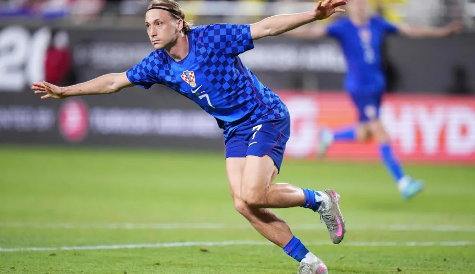 ORLANDO, FLORIDA - MARCH 31: Lovro Majer of Croatia celebrates after scoring his team's first goal during the international friendly match between Brazil and Croatia at Camping World Stadium on March 31, 2026 in Orlando, Florida. Rich Storry/Getty Images/AFP (Photo by Rich Storry/GETTY IMAGES NORTH AMERICA/Getty Images via AFP)