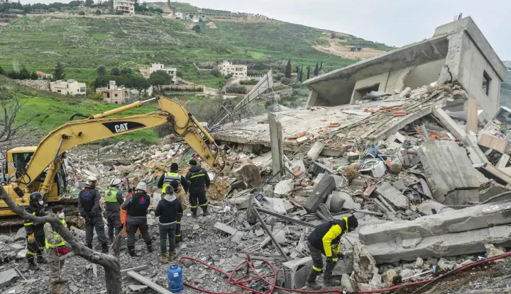 First responders search for survivors at the site of an overnight Israeli airstrike that targeted a house in the southern Lebanese village of Zibdine, on April 2, 2026. Lebanon was drawn into the Middle East war on March 2 when Tehran-backed militant group Hezbollah launched attacks on Israel to avenge the killing of the Iranian leader. Israel has responded with broad strikes across Lebanon and a ground offensive. (Photo by Abbas FAKIH/AFP)