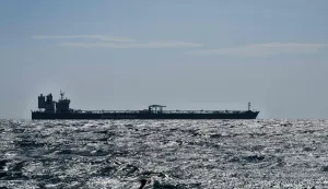 This photograph taken from the beach "Plage des Rainaires" in Martigues, southern France shows the oil tanker "Delta tankers" in the sea, on March 25, 2026. (Photo by Elodie CLEMENT/AFP)