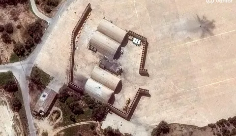 This handout satellite image courtesy of Vantor shows a closer view of airstrikes on hardened aircraft shelters at an airbase next to Bushehr International Airport on March 7, 2026. The United States and Israel launched strikes against Iran on February 28, sparking swift retaliation by the Islamic republic which responded with missile attacks across the region. The war has dragged in global powers, upended the world's energy and transport sectors, and brought chaos to even usually peaceful areas of the volatile region. (Photo by Satellite image &Acirc;&copy;2026 Vantor/AFP)/RESTRICTED TO EDITORIAL USE - MANDATORY CREDIT "AFP PHOTO/SATELLITE IMAGE (C) 2026 Vantor" - HANDOUT - NO MARKETING NO ADVERTISING CAMPAIGNS - DISTRIBUTED AS A SERVICE TO CLIENTS - THE WATERMARK MAY NOT BE REMOVED/CROPPED