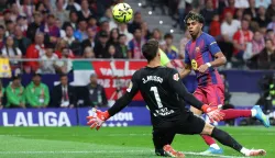 Barcelona's Spanish forward #10 Lamine Yamal attempts to score during the Spanish league football match between Club Atletico de Madrid and FC Barcelona at Metropolitano Stadium in Madrid on April 4, 2026. (Photo by Pierre-Philippe MARCOU/AFP)