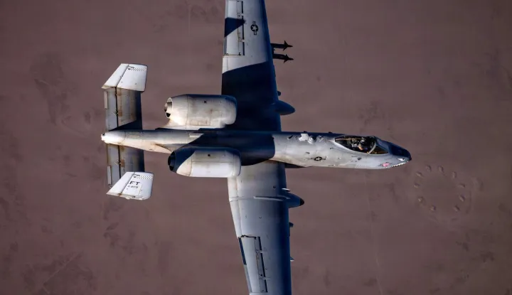 In this US Air Force handout photo released by US Central Command public affairs, a US Air Force A-10 Thunderbolt II aircraft flies over the US Central Command area of responsibility during Operation Epic Fury on March 9, 2026. Tehran said on April 3 that it had shot down an F-15 warplane and US media reported United States special forces had rescued one of its two crew members, with the other still missing. Iran's military also said it downed a US A-10 ground attack aircraft in the Gulf, with US media saying the pilot of that plane was rescued. (Photo by US Airforce/AFP)/RESTRICTED TO EDITORIAL USE - MANDATORY CREDIT "AFP PHOTO/US AIR FORCE PHOTO and US CENTRAL COMMAND/HANDOUT" - HANDOUT - NO MARKETING NO ADVERTISING CAMPAIGNS - DISTRIBUTED AS A SERVICE TO CLIENTS