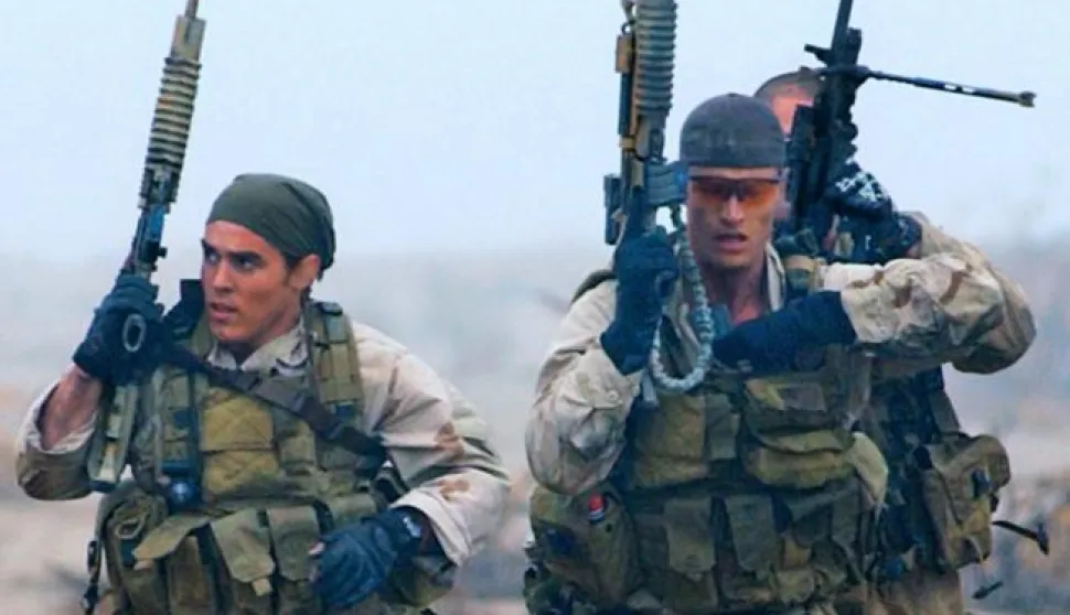 040222-N-3953L-349 Remote Training Facility (February 22, 2004) -- Members of a SEAL Team practice desert training exercises in preparation for real world scenarios.  Navy SEALs are maritime special operations forces who strike from the SEa, Air and Land. They operate in small numbers, infiltrating their objective areas by fixed-wing aircraft, helicopters, navy surface ships, combatant craft and submarines. SEALs have the ability to conduct a variety of high-risk missions- unconventional warfare, direct action, special reconnaissance, combat search and rescue, diversionary attacks and precision strikes- all in a clandestine fashion.Official U.S. Navy photo by Photographer's Mate 2nd Class Eric S. Logsdon, Naval Special Warfare Command Public Affairs Office. (RELEASED)