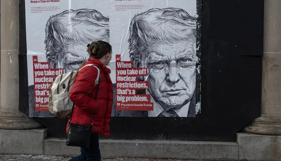 A woman walks past a wall poster in Washington, DC, on January 30, 2026, that warns of the impending expiration of the New START treaty. As the last remaining limit on U.S. and Russian nuclear weapons, the poster quotes President Trump, who has said it is ?not an agreement you want expiring.? (Photo by Probal Rashid/Sipa USA) Photo: Probal Rashid/SIPA USA