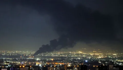 TOPSHOT - Smoke rises from the site of a US-Israeli strike on the Iranian capital Tehran on April 7, 2026. UN chief Antonio Guterres expressed alarm on April 7, 2026, at the US president's dire warning that "a whole civilization will die" in Iran if the country does not meet an ultimatum to accept US war demands. On February 28, Israel and the United States launched strikes on Iran, killing its supreme leader and triggering a war that spread across the Middle East. (Photo by ATTA KENARE/AFP)/