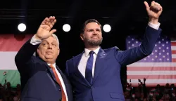 US Vice President JD Vance (R) and Hungarian Prime Minister Viktor Orban appear on stage together during a "Day of Friendship" event at MTK Sportpark in Budapest, Hungary on April 7, 2026. US Vice President JD Vance is in Hungary to deliver the US President's support to his ally, nationalist Prime Minister Viktor Orban, ahead of tightly contested parliamentary elections scheduled for April 12, 2026. (Photo by Jonathan Ernst/POOL/AFP)/ALTERNATIVE CROP