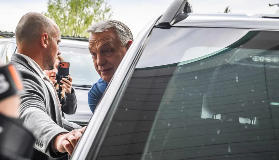 Hungarian Prime Minister Viktor Orban gets in his car in a tank station during his way to Debrecen for a election rally on April 9, 2026, near Polgar, Hungary. General elections will be held in Hungary on April 12, 2026. (Photo by Ferenc ISZA/AFP)