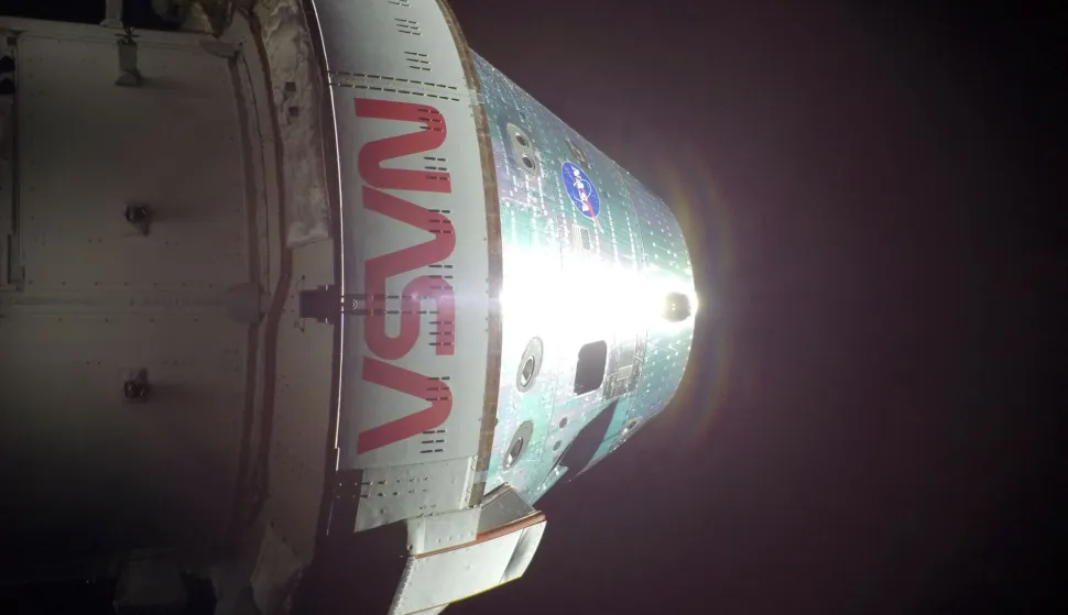 This handout picture released on April 8, 2026 by NASA, shows the Orion spacecraft on the sixth day into the Artemis II mission, photographed from one of the cameras mounted on its solar array wings, on April 7, 2026. During their historic lunar flyby, astronauts on NASA's Artemis II mission witnessed meteorites striking the rugged surface of the Moon, a sight that has piqued scientists' curiosity. "That was definitely impact flashes on the moon. And Jeremy (Hansen) just saw another one," mission commander Reid Wiseman reported on April 6, 2026 while flying around the Moon, the first such journey by humans in more than half a century. (Photo by Handout/NASA/AFP)/RESTRICTED TO EDITORIAL USE - MANDATORY CREDIT "AFP PHOTO/NASA" - HANDOUT - NO MARKETING NO ADVERTISING CAMPAIGNS - DISTRIBUTED AS A SERVICE TO CLIENTS