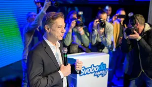 Slovenia?s Prime Minister Robert Golob (L) addresses the supporters of Gibanje Svoboda (The Freedom Movement) after the General Elections results are released in Ljubljana, Slovenia, on March 22, 2026. Slovenia's incumbent liberal Prime Minister Robert Golob on March 22, 2026 claimed victory in parliamentary elections, even as official results showed a neck and neck finish with the conservatives. (Photo by Jure Makovec/AFP)