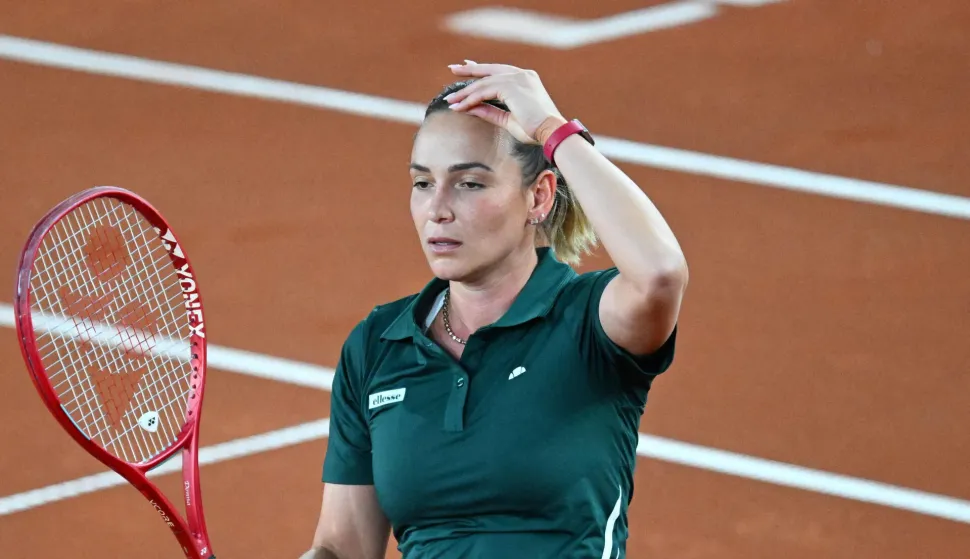 Croatia's Donna Vekic reacts while playing against Austria's Anastasia Potapova during their women's semi-final match of the WTA Upper Austria Women's Linz tennis tournament in Linz, Austria on April 11, 2026. (Photo by BARBARA GINDL/APA/AFP)/Austria OUT