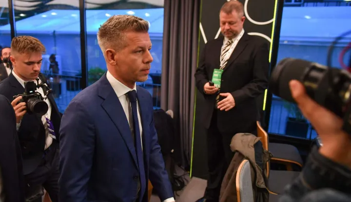 Peter Magyar, leader of the pro-European conservative TISZA party, arribes to make a statement in Budapest during the general election in Hungary, on April 12, 2026. Polls closed in Hungary's parliamentary election, with turnout reaching a record high in the crunch vote that sees nationalist Prime Minister Viktor Orban's 16-year stint in power face an unprecedented challenge from conservative political newcomer Peter Magyar. (Photo by Ferenc ISZA/AFP)