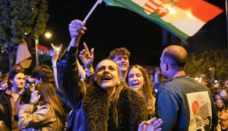 HUNGARY, BUDAPEST - APRIL 13, 2026: Supporters of the opposition Tisza party, which won the 2026 Hungarian parliamentary elections, during a victory rally. Alexander Ryumin/TASS/Sipa USA Photo: Tass/SIPA USA