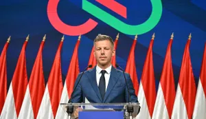 TOPSHOT - Peter Magyar, leader of the pro-European conservative TISZA party, delivers a press conference at the HUNGEXPO Congress and Exhibition Center in Budapest, Hungary, on April 13, 2026. The party of conservative Peter Magyar won a two-thirds parliamentary majority in Hungarian elections in a clear defeat for nationalist long-time Prime Minister Viktor Orban, according to near-complete results. (Photo by Attila KISBENEDEK/AFP)