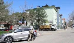This handout photograph taken and released on April 14, 2026 by Turkish news agency DHA (Demiroren News Agency) shows special force security surrounding the school as students are evacuated in southeastern Turkey. An ex-student opened fire at his former high school on April 14, 2026 in Turkey, wounding 16 people including students before killing himself in a showdown with police, officials said. Special security forces were deployed to the school in the southeastern province of Sanliurfa, where students were evacuated, the local governor, Hasan Sildak, told reporters. (Photo by Handout/DHA (Demiroren News Agency)/AFP)/Turkey OUT/RESTRICTED TO EDITORIAL USE - MANDATORY CREDIT "AFP PHOTO/DHA (Demiroren News Agency) " - NO MARKETING NO ADVERTISING CAMPAIGNS - DISTRIBUTED AS A SERVICE TO CLIENTS