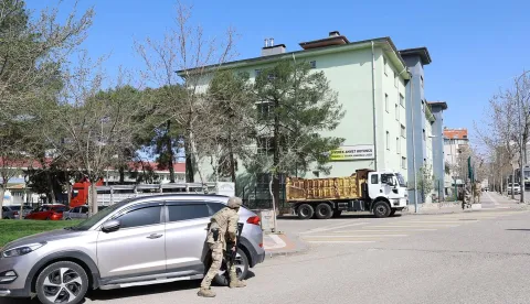 This handout photograph taken and released on April 14, 2026 by Turkish news agency DHA (Demiroren News Agency) shows special force security surrounding the school as students are evacuated in southeastern Turkey. An ex-student opened fire at his former high school on April 14, 2026 in Turkey, wounding 16 people including students before killing himself in a showdown with police, officials said. Special security forces were deployed to the school in the southeastern province of Sanliurfa, where students were evacuated, the local governor, Hasan Sildak, told reporters. (Photo by Handout/DHA (Demiroren News Agency)/AFP)/Turkey OUT/RESTRICTED TO EDITORIAL USE - MANDATORY CREDIT "AFP PHOTO/DHA (Demiroren News Agency) " - NO MARKETING NO ADVERTISING CAMPAIGNS - DISTRIBUTED AS A SERVICE TO CLIENTS