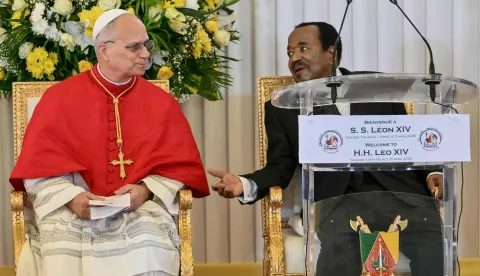 TOPSHOT - Pope Leo XIV (R) meets with Cameroon's President Paul Biya (R) at The Presidential Palace in Yaounde, on the third day of an 11-day apostolic journey to Africa, on April 15, 2026. (Photo by Alberto PIZZOLI/AFP)