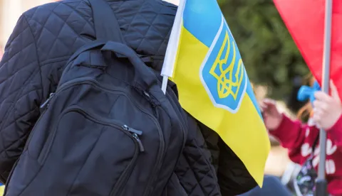 Protests against the Russian invasion of Ukraine in the center of Chisinau, Moldova. A man with Ukrainian flagukrajina, zastava, izbjeglice freepik