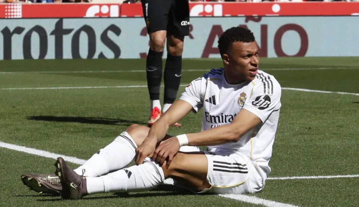 Real Madrid's French forward #10 Kylian Mbappe reacts after failing to score during the Spanish league football match between RCD Mallorca and Real Madrid CF at Mallorca Son Moix Stadium in Palma de Mallorca on April 4, 2026. (Photo by JAIME REINA/AFP)