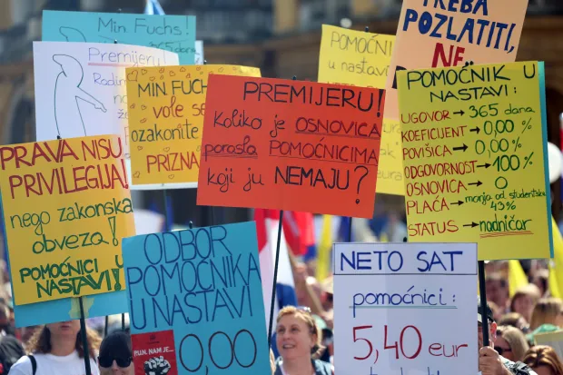 Zagreb, 18.04.2026. - Savez samostalnih sindikata Hrvatske (SSSH), Nezavisni hrvatski sindikati (NHS) i Matica hrvatskih sindikata (MHS) te Sindikat umirovljenika Hrvatske (SUH) organizirali su prosvjed "Hrvatska zajedno za veće plaće i mirovine". Na fotografiji okupljanje kod HNK. foto HINA/ Lana SILVAR DOMINIĆ/ tm