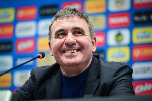 Newly appointed head coach of Romania's national football team Gheorghe Hagi attends a press conference in Bucharest on April 20, 2026. Hagi signed a four-year contract to return to the helm of the national team. The 61-year-old legend, nicknamed "The King" and "Maradona of the Carpathians," succeeded the late Mircea Lucescu with ambitious goals to win the Nations League and qualify for the European Championships. (Photo by Daniel MIHAILESCU/AFP)