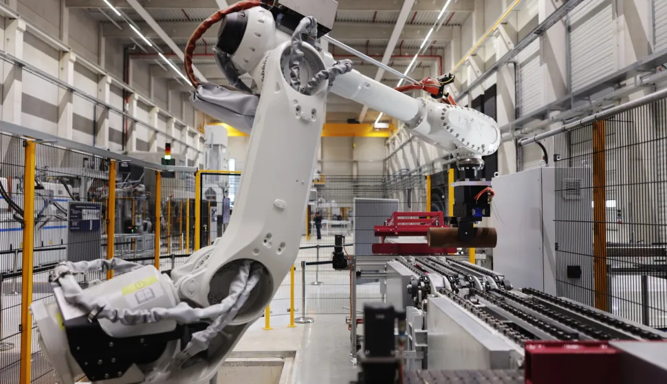 epa12328381 A production line for shells for artillery ammunition is seen during the official opening ceremony of a new Rheinmetall ammunition plant in Unterluess, Germany, 27 August 2025. According to Rheinmetall, once fully operational in 2027, the factory will have the capacity to produce up to 350,000 rounds of 155mm artillery ammunition annually. The company also plans to expand production at the plant to include rocket artillery starting in 2026. EPA/HANNIBAL HANSCHKE