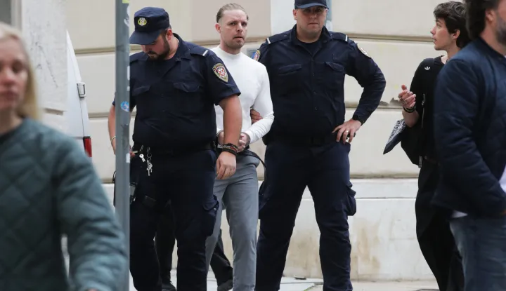 21.04.2026., Rijeka - Robert Dicaprio u pratnji policajaca dolazi na USKOK. Photo: Goran Kovacic/PIXSELL