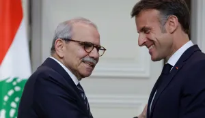 France's President Emmanuel Macron (R) shakes hands with Lebanon's Prime Minister Nawaf Salam at the end of a joint declaration press event following their meeting at the Elysee Presidential Palace in Paris on April 21, 2026. (Photo by Ludovic MARIN/POOL/AFP)