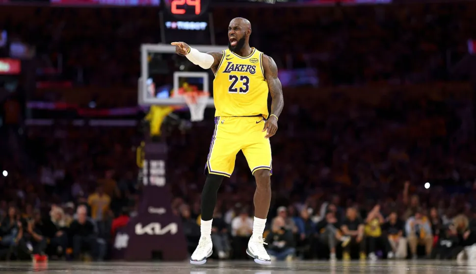 LOS ANGELES, CALIFORNIA - APRIL 18: LeBron James #23 of the Los Angeles Lakers reacts to making a shot during the first half of Game One of the First Round of the NBA Western Conference Playoffs against the Houston Rockets at Crypto.com Arena on April 18, 2026 in Los Angeles, California. Sean M. Haffey/Getty Images/AFP (Photo by Sean M. Haffey/GETTY IMAGES NORTH AMERICA/Getty Images via AFP)