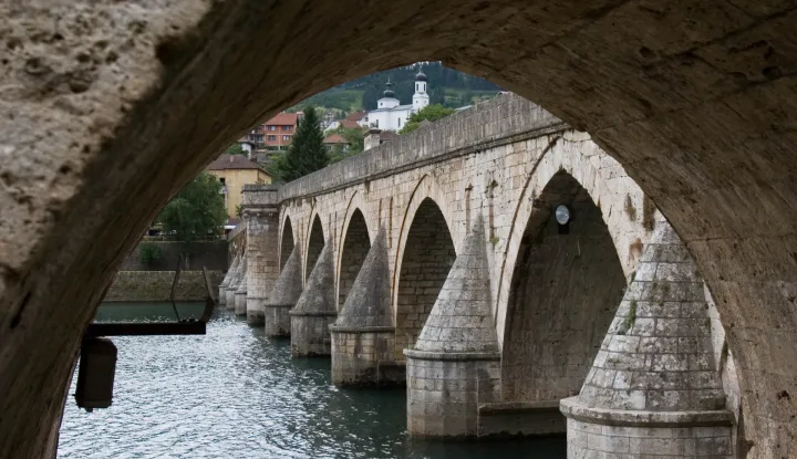 ** FILE ** The Mehmed Pasha Sokolovic bridge over the Drina river in the east Bosnian town of Visegrad is seen in this July 25, 2007 file photo. UNESCO Director Koichiro Matsuura said Tuesday, March 25, 2008 his organization recognized the "outstanding universal value" of a 16th century Ottoman bridge in Bosnia which is officially now on the UNESCO World Heritage List. (AP Photo/Amel Emric, file)