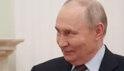 Russian President Vladimir Putin attends a meeting with Kyrgyzstan's President at the Kremlin in Moscow on April 23, 2026. (Photo by MAXIM SHIPENKOV/POOL/AFP)