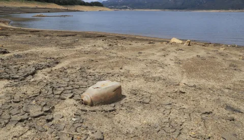 epa11273062 Extensive beaches have been formed due to the low water levels in the San Rafael reservoir in the municipality of La Calera, Colombia, 11 April 2024. The Mayor's Office of Bogota ordered water rationing, starting on 11 April, due to the low levels of the reservoirs supplying the city due to a drought aggravated by the El Nino phenomenon. The measure affects about 8 million inhabitants in numerous neighborhoods in the center and north of the capital city of Colombia, who will see their running water supply cut for 24 hours. EPA/Carlos Ortega
