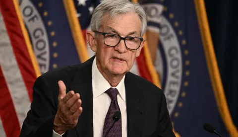 (FILES) US Federal Reserve Chair Jerome Powell speaks during a press conference following the Federal Open Market Committee meeting at the Federal Reserve Board Building in Washington, DC, on March 18, 2026. US prosecutor Jeanine Pirro dropped a criminal probe involving Federal Reserve Chair Jerome Powell on April 24, 2026 clearing the way for his replacement's confirmation amid concerns over President Donald Trump's attacks on the independent central bank. In a social media post, Pirro said the inspector general for the Fed would instead look into renovation cost overruns. "Accordingly, I have directed my office to close our investigation." (Photo by Brendan SMIALOWSKI/AFP)