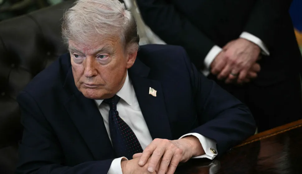 US President Donald Trump meets with Lebanon's Ambassador to the US, Nada Hamadeh Moawad, and Israel's Ambassador to the US, Yechiel Leiter, at the White House in Washington, DC on April 23, 2026. US President Donald Trump met Lebanese and Israeli envoys at a new round of peace talks Thursday, with Beirut seeking a one-month extension of a shaky ceasefire set to expire. (Photo by Brendan SMIALOWSKI/AFP)
