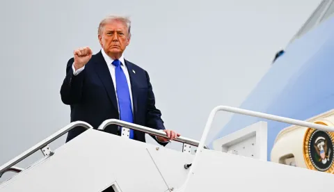 US President Donald Trump boards Air Force One at Joint Base Andrews, Maryland on April 24, 2026. Trump is heading to Palm Beach to spend the weekend at his Mar-a-Lago resort. (Photo by Kent NISHIMURA/AFP)