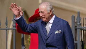 Britain's King Charles III and Britain's Queen Camilla leave St George's Chapel, in Windsor, west of London, after attending the Easter Matins Service, on April 5, 2026. (Photo by Alberto Pezzali/POOL/AFP)